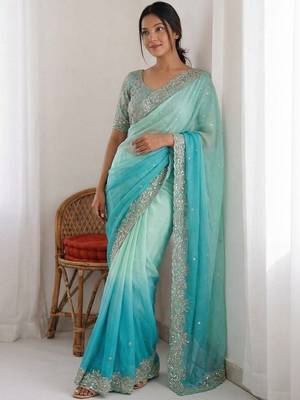 Turquoise embellished sarees stitched blouse 1