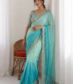 Turquoise embellished sarees stitched blouse