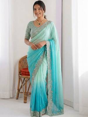 Turquoise embellished sarees stitched blouse 2