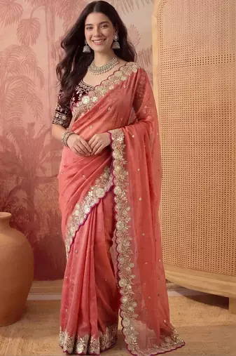 Peach embellished embroidered poly georgette saree
