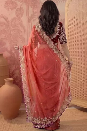Peach embellished embroidered poly georgette saree