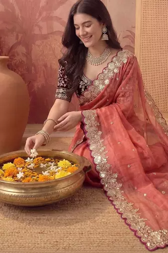 Peach embellished embroidered poly georgette saree