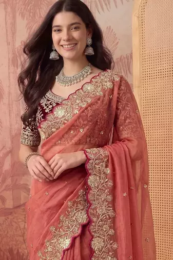 Peach embellished embroidered poly georgette saree