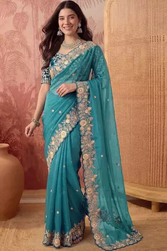 Teal embellished embroidered poly georgette saree