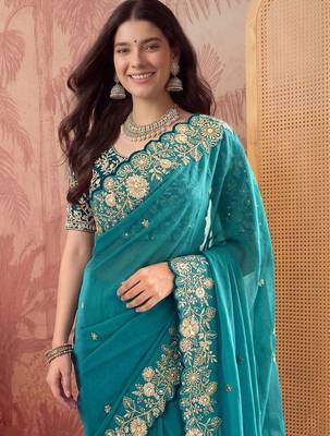 Teal embellished embroidered poly georgette saree 3