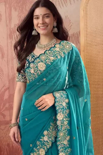 Teal embellished embroidered poly georgette saree