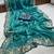 Teal embellished embroidered poly georgette saree