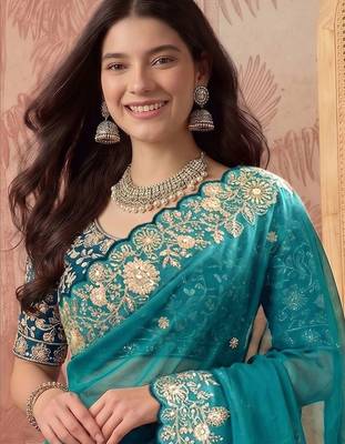 Teal embellished embroidered poly georgette saree 5