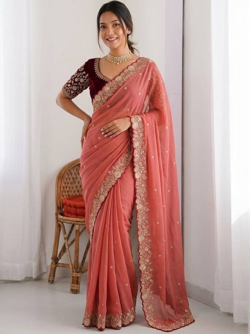Peach embellished embroidered  georgette heavy work saree
