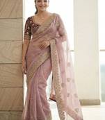Lavender embroidered zari sequinned saree with stitched blouse