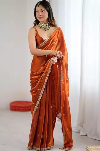 Orange floral embroidered tissue designer saree