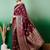 Burgundy ethnic motif zari woven kanjeevaram saree with blouse