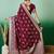 Burgundy ethnic motif zari woven kanjeevaram saree with blouse
