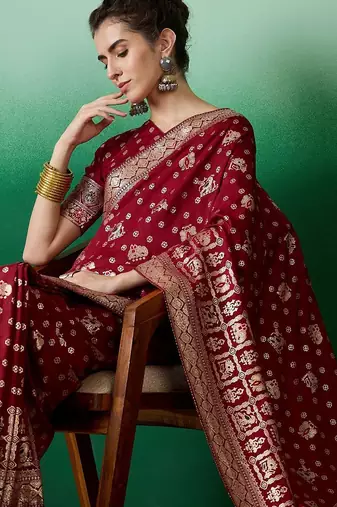 Maroon ethnic motif zari woven kanjeevaram saree with blouse