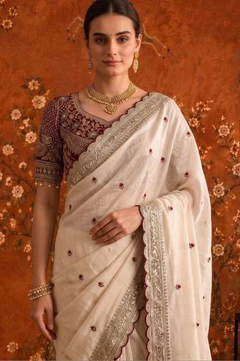 Off white embellished embroidered satin saree