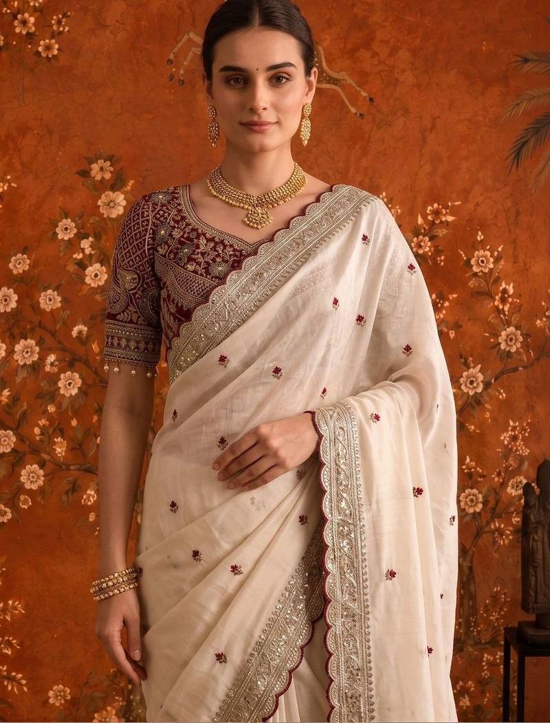 Off white embellished embroidered satin saree