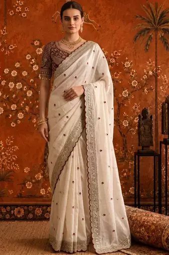 Off white embellished embroidered satin saree