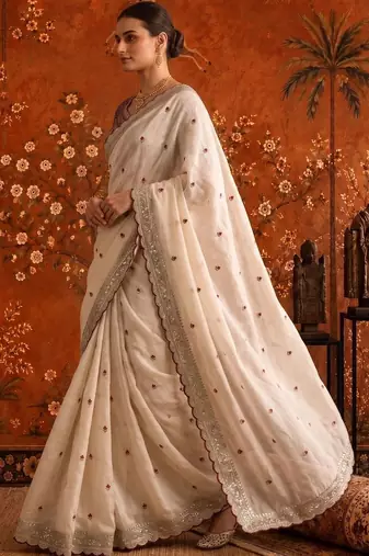 Off white embellished embroidered satin saree