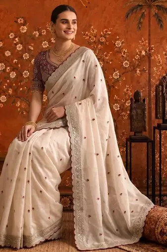 Off white embellished embroidered satin saree