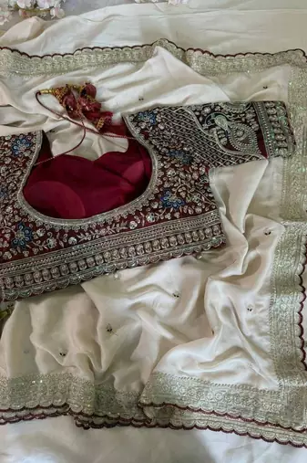 Off white embellished embroidered satin saree