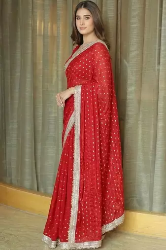 Red ethnic motifs sequinned satin saree