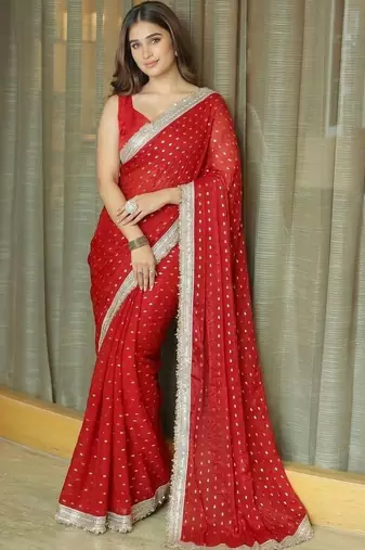 Red ethnic motifs sequinned satin saree