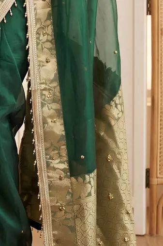 Green woven design beads and stones silk blend designer banarasi saree