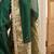 Green woven design beads and stones silk blend designer banarasi saree
