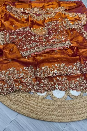 Orange embellished embroidered satin saree