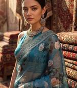 Teal floral embroidered organza designer saree