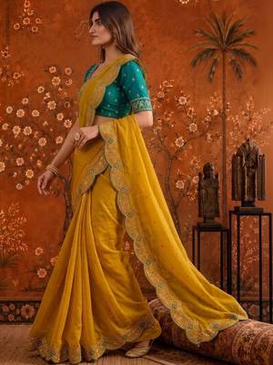 Yellow women embellished embroidered saree 3