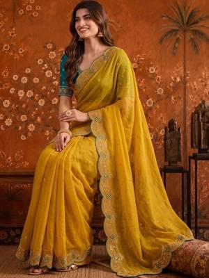 Yellow women embellished embroidered saree 4