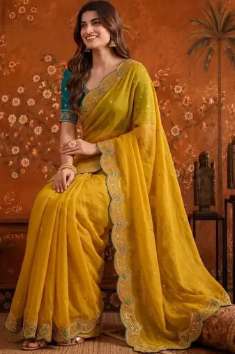 Yellow women embellished embroidered saree