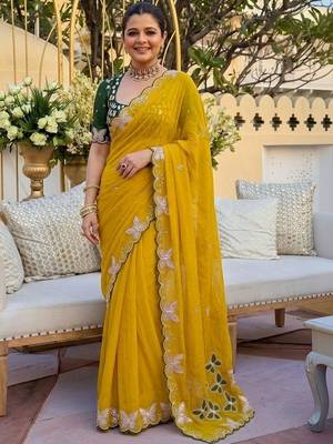 Yellow women ethnic motifs embroidered  georgette saree 1
