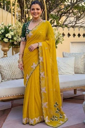 Yellow women ethnic motifs embroidered  georgette saree
