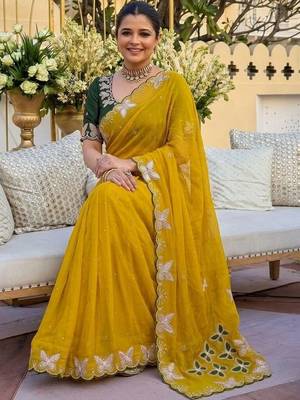 Yellow women ethnic motifs embroidered  georgette saree 4