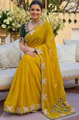 Yellow women ethnic motifs embroidered  georgette saree