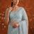 Turquoise women embellished beads and stones net fusion saree
