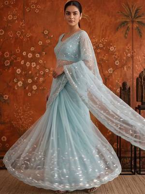 Turquoise women embellished beads and stones net fusion saree 5
