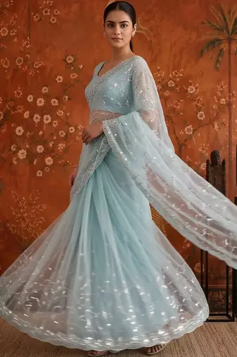 Turquoise women embellished beads and stones net fusion saree