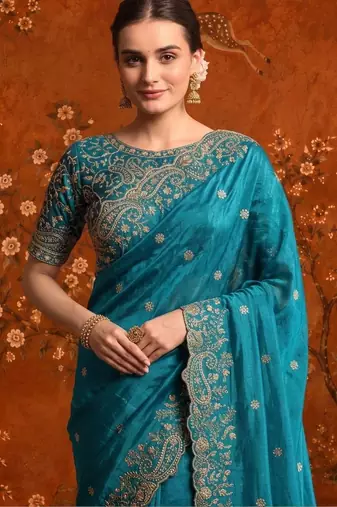 Teal embellished embroidered satin saree