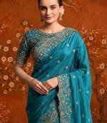 Teal embellished embroidered satin saree