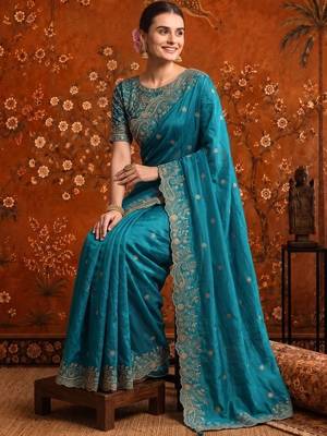 Teal embellished embroidered satin saree 4