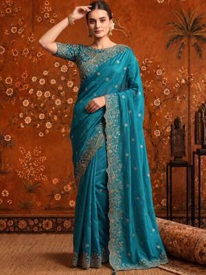 Teal embellished embroidered satin saree 5