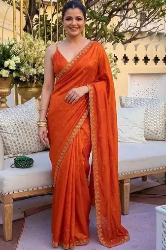 Orange ethnic motifs sequinned satin saree