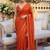 Orange ethnic motifs sequinned satin saree