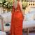 Orange ethnic motifs sequinned satin saree
