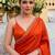Orange ethnic motifs sequinned satin saree