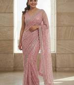 Pink embroidered embellished beads & stones net saree