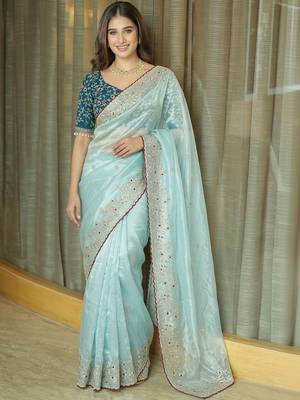 Turquoise embellished embroidered tissue saree 1